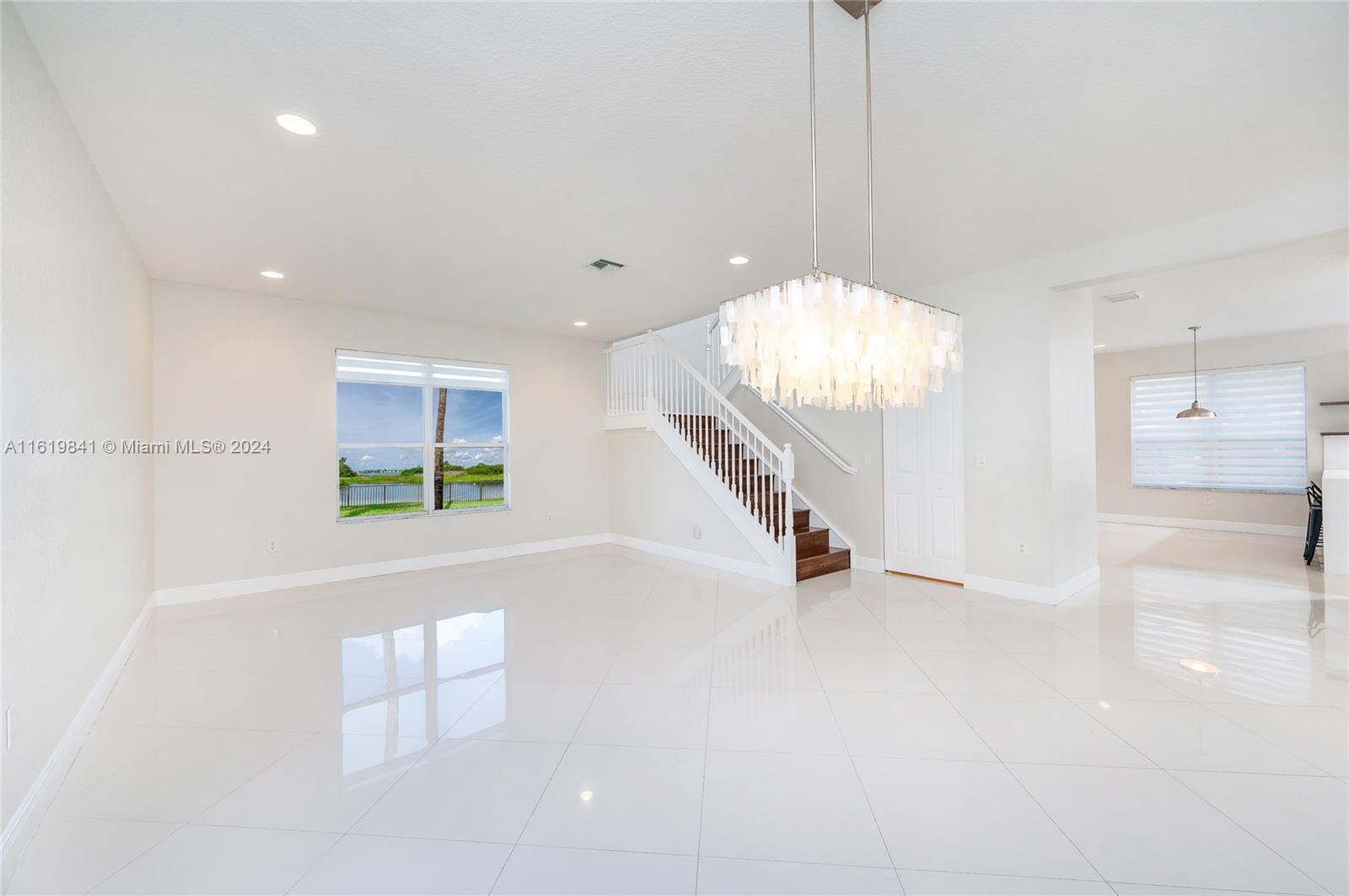 4136 Southwest 179th Way Miramar, FL 33029 - Photo 8 of 42 a view of an empty room with a window