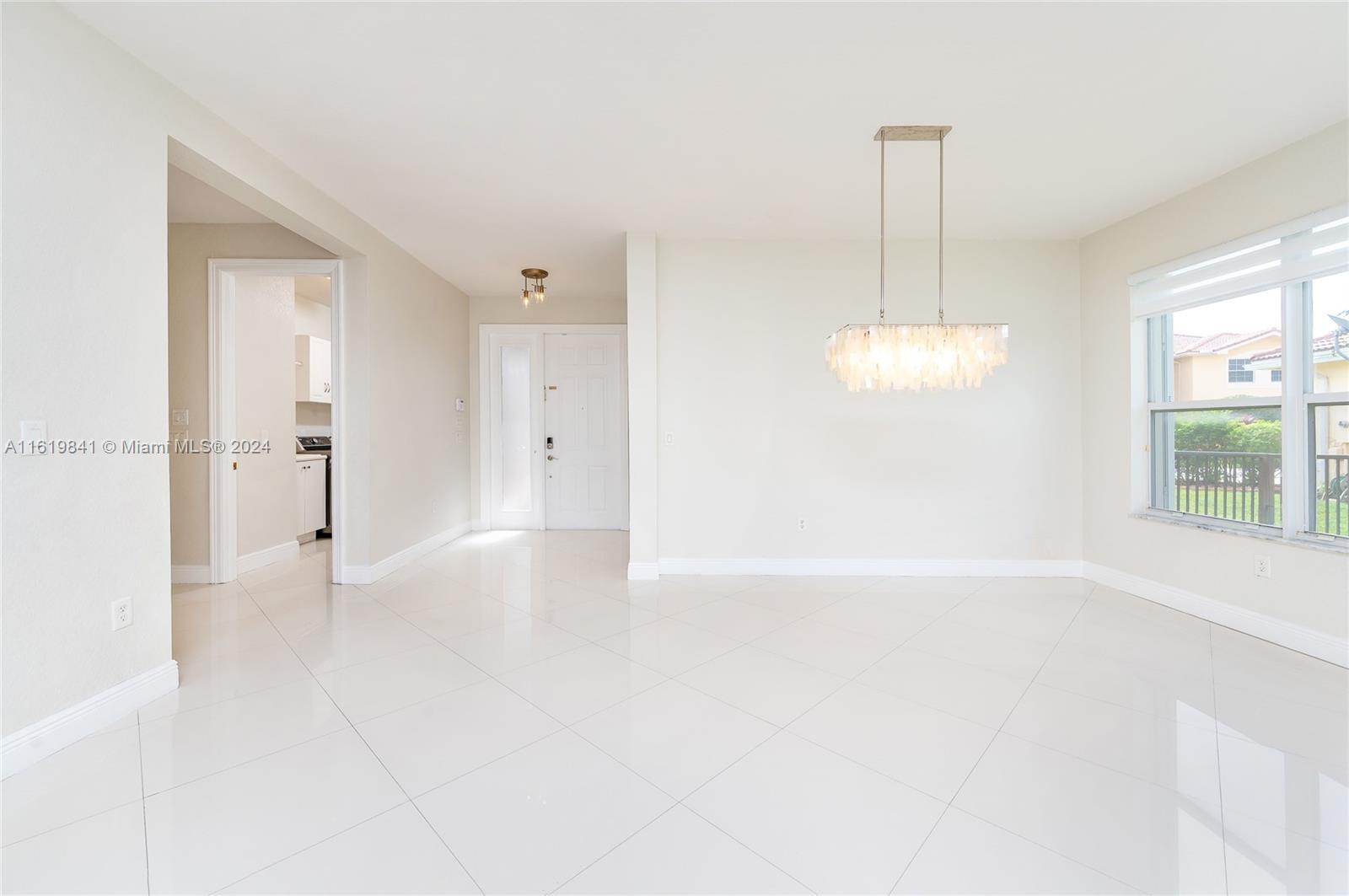 4136 Southwest 179th Way Miramar, FL 33029 - Photo 10 of 42 a view of an empty room with a window