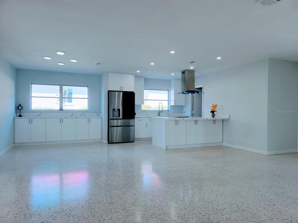1732 Boca Raton Court Punta Gorda, FL 33950 - Photo 24 of 64 a view of kitchen with refrigerator and white cabinets