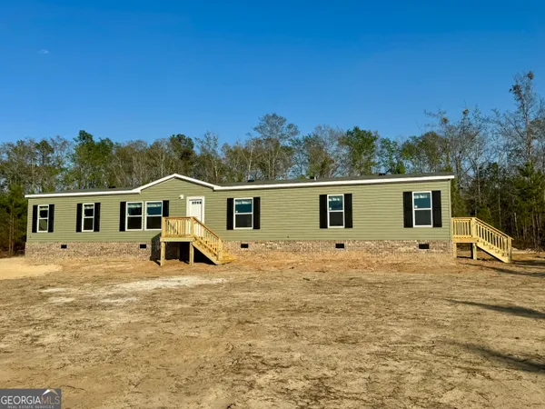a view of a house with a patio