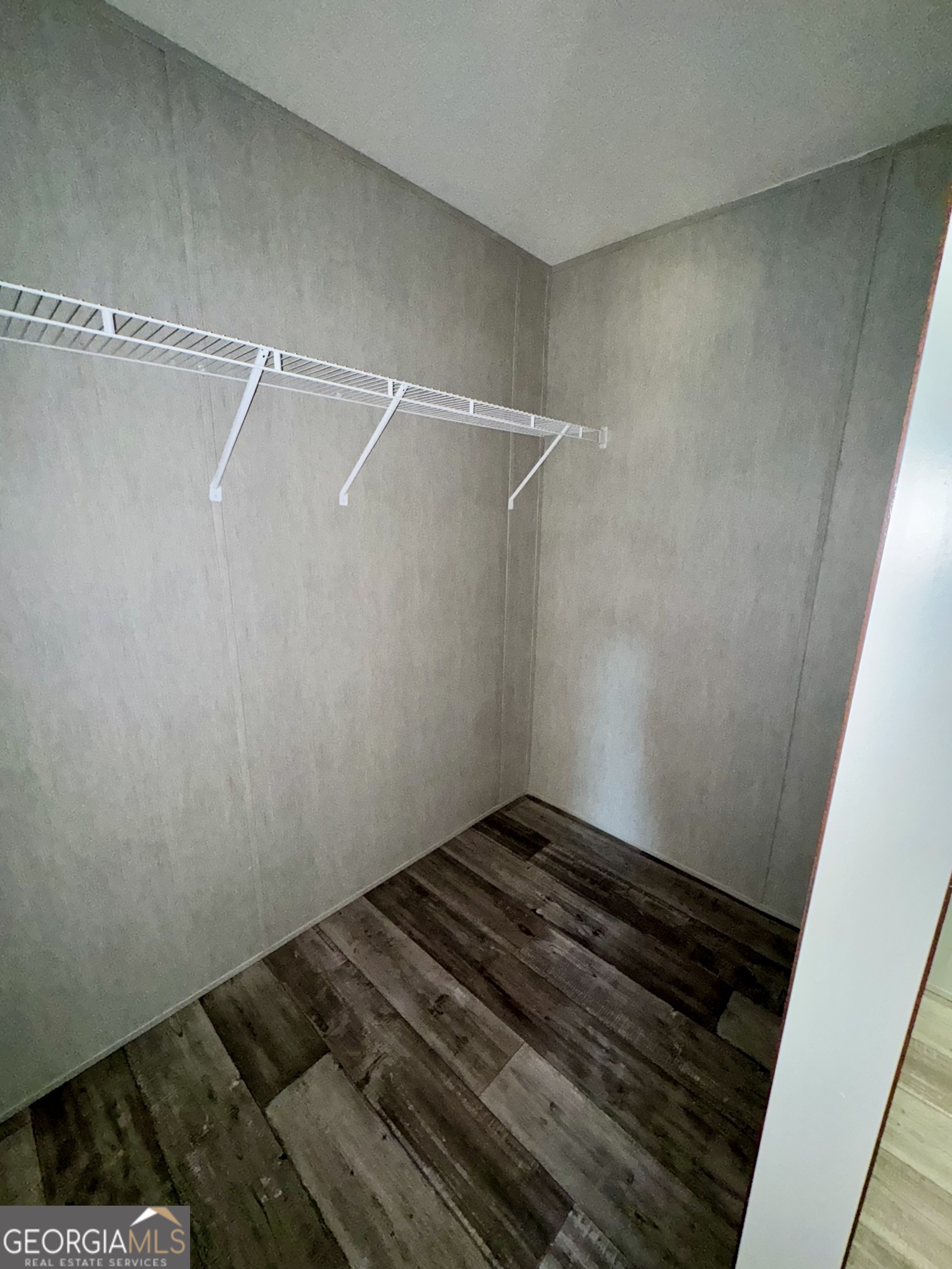 545 Ben Jackson Road Vidalia, GA 30474 - Photo 11 of 25 a view of a room with racks on the wall