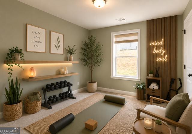 31 Rolling Woods Lane Colbert, GA 30628 - Photo 25 of 30 a living room with furniture and a potted plant