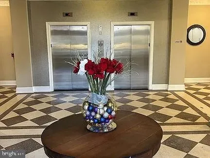 a vase of flowers sitting on a table