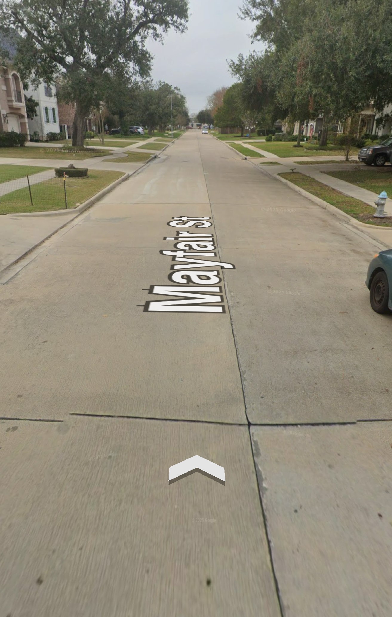 4909 Mayfair Street Bellaire, TX 77401 - Photo 3 of 4 a view of a city street