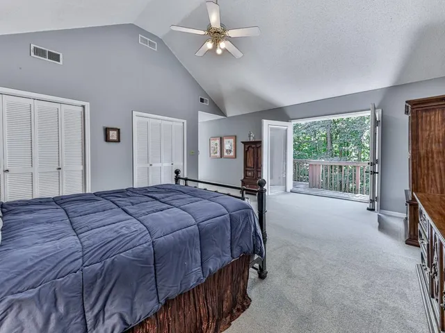 a spacious bathroom with a sink vanity and mirror