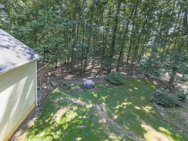 a view of a door and a window