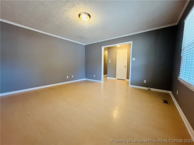 an empty room with windows