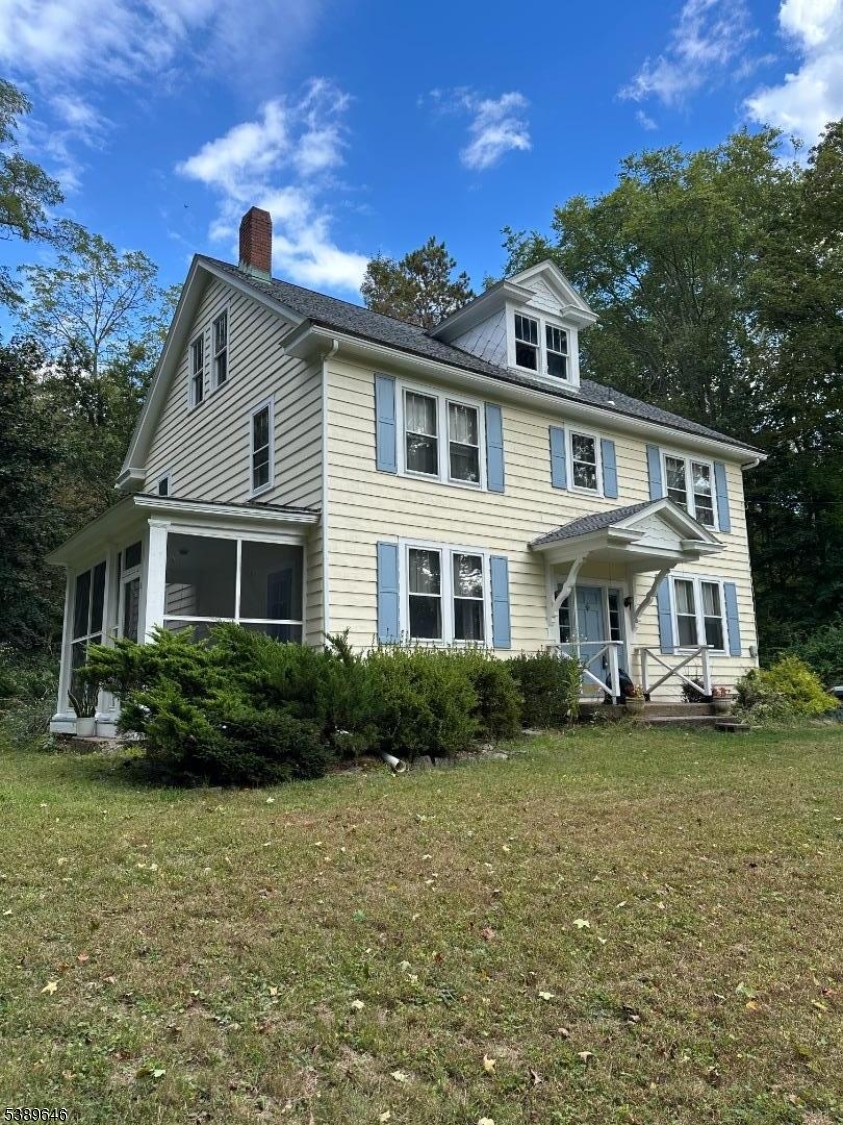 218 Highway 31 Hampton, NJ 08827 - Photo 1 of 18 a front view of a house with a yard