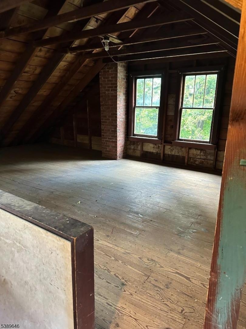 218 Highway 31 Hampton, NJ 08827 - Photo 14 of 18 a view of an empty room with a fireplace and a window