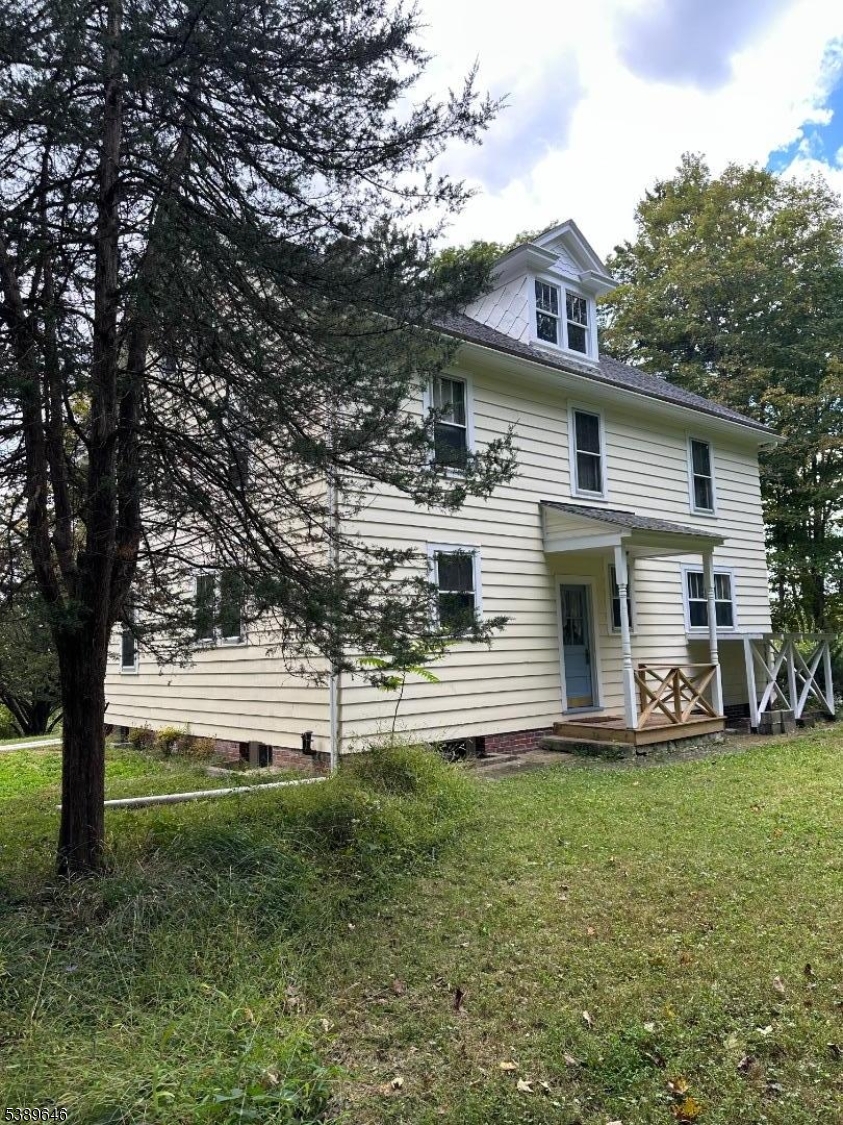 218 Highway 31 Hampton, NJ 08827 - Photo 16 of 18 a front view of house with yard and green space