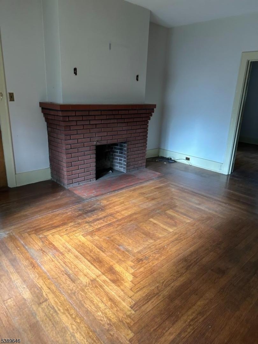 218 Highway 31 Hampton, NJ 08827 - Photo 5 of 18 a view of empty room with wooden floor