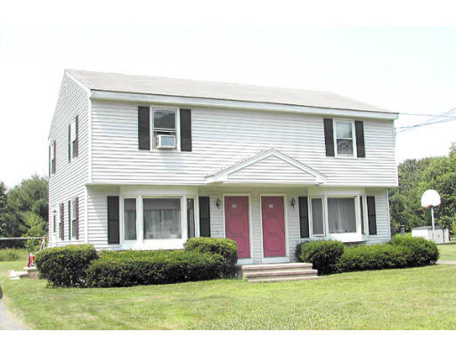37-39 Point Grove Road Southwick, MA 01077 - Photo 1 of 1 a front view of a house with a yard