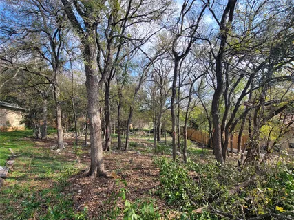 a view of house with trees in the background