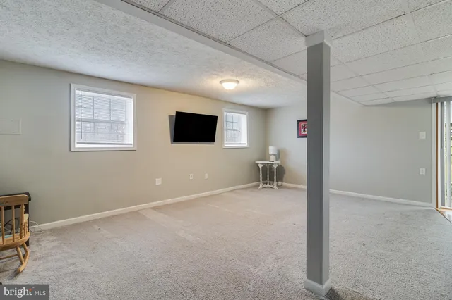 a view of a livingroom with a flat screen tv