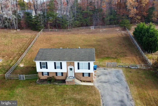a view of a house with swimming pool