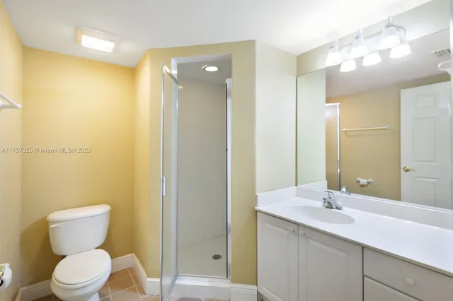 a view of a balcony with wooden floor