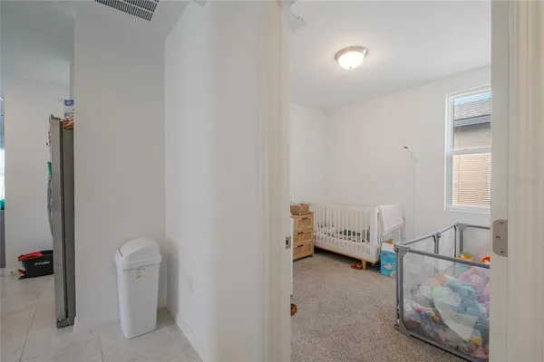 a bathroom with a sink vanity and a mirror