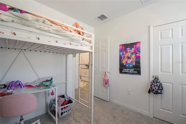 a living room with furniture and toys