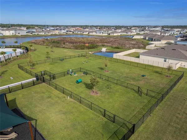 an aerial view of a house with garden space and stairs