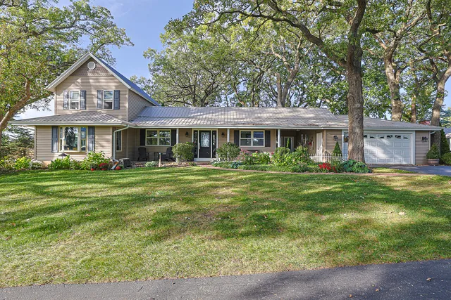 a kitchen with a sink appliances and cabinets