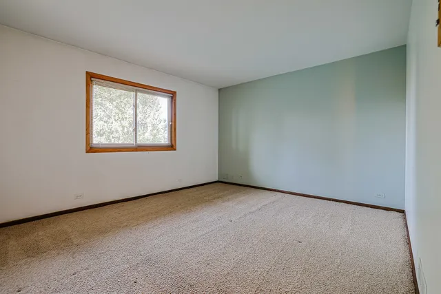 a view of a room that has a window