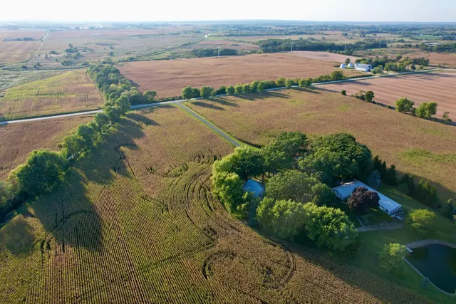 a garden view with a lake