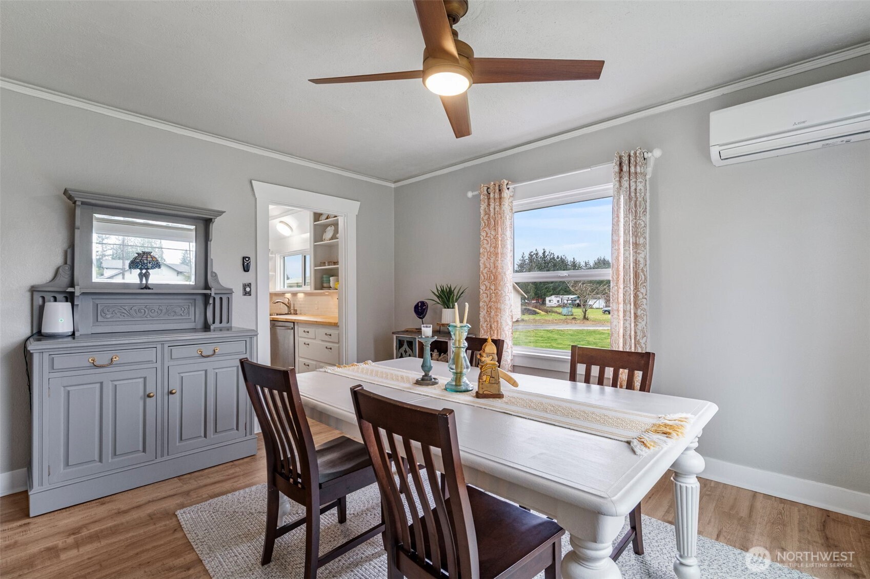 862 King Road Winlock, WA 98596 - Photo 15 of 40 a view of a dining room with furniture window and wooden floor