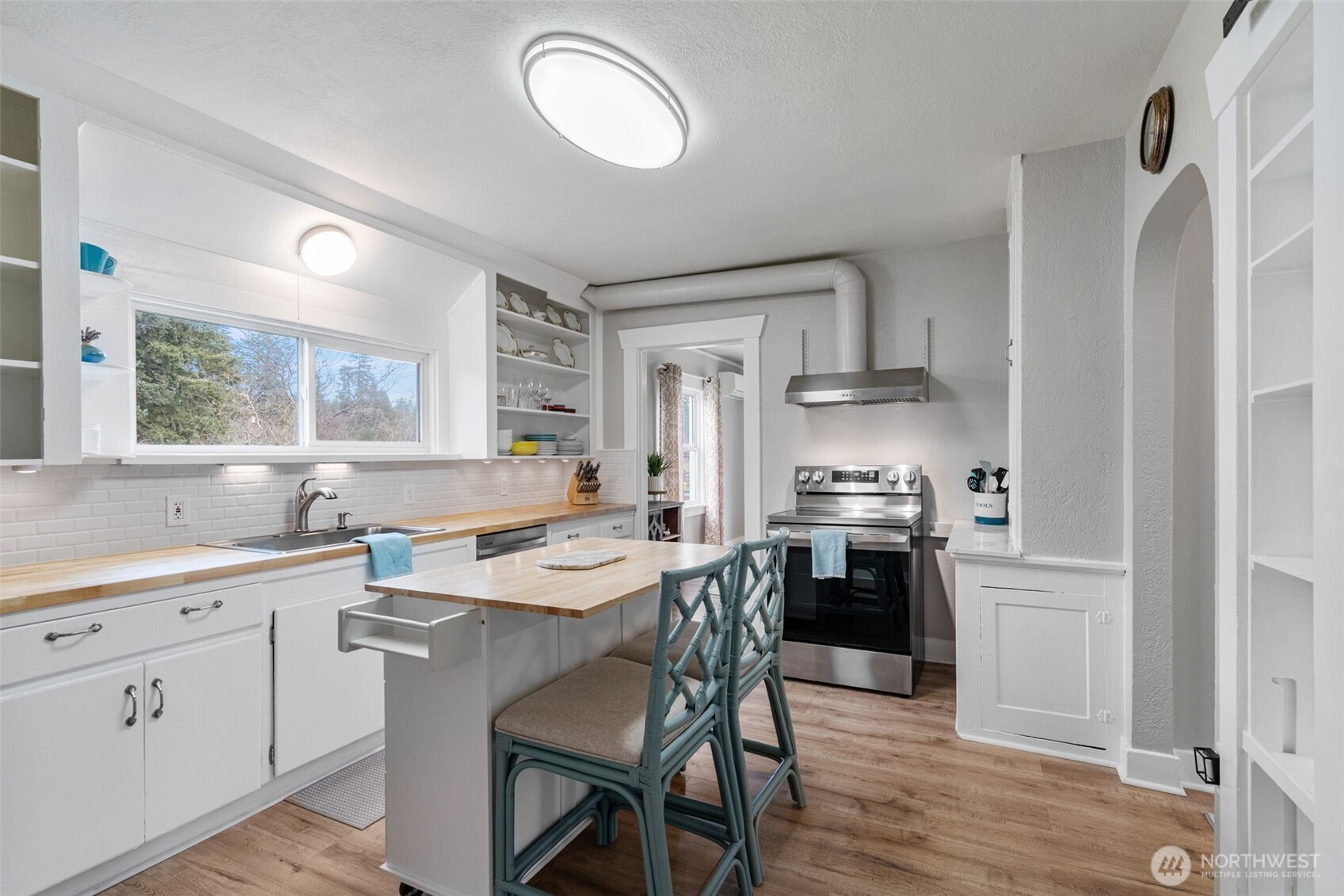 862 King Road Winlock, WA 98596 - Photo 17 of 40 a kitchen with white cabinets and white appliances