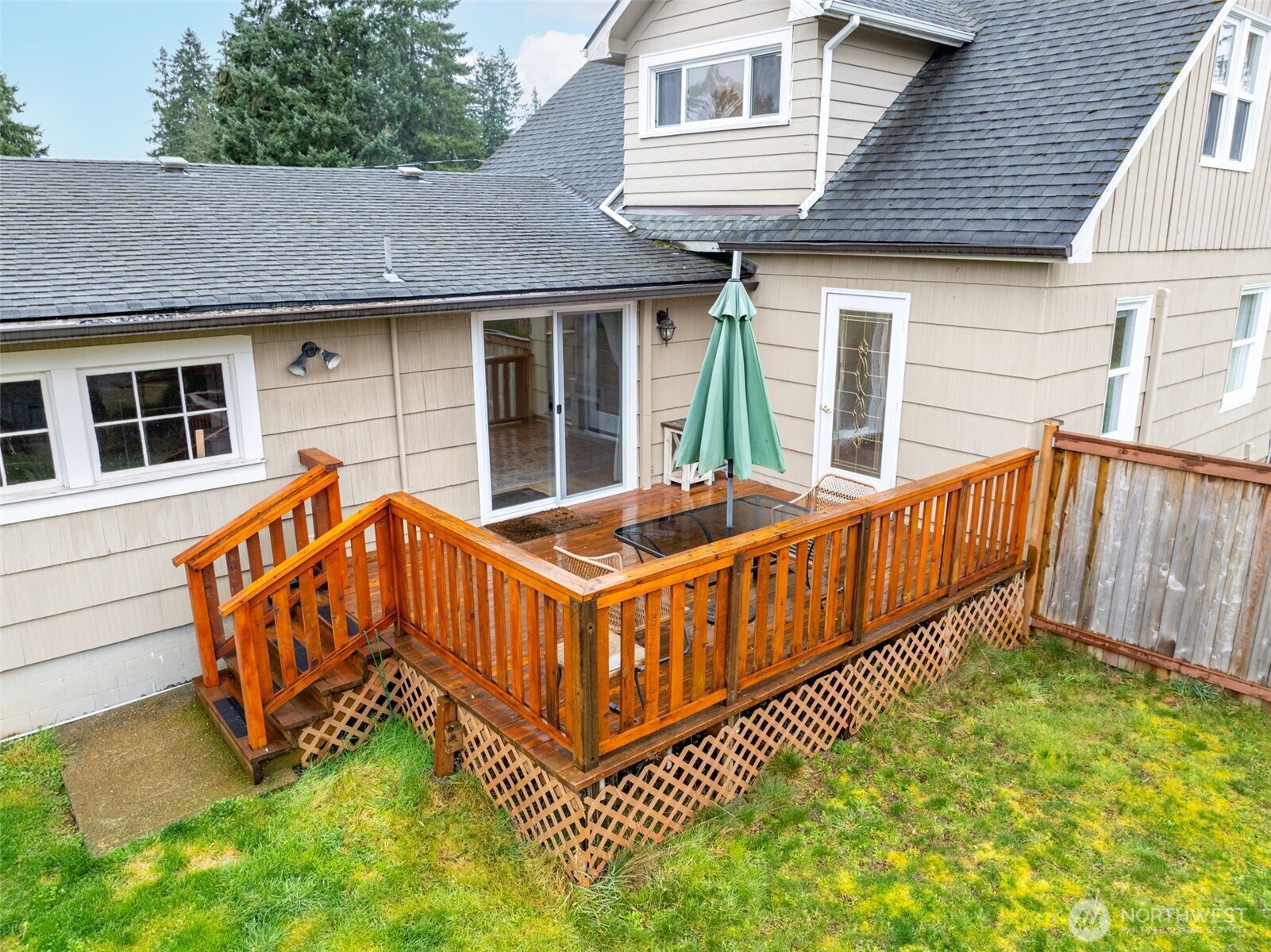 862 King Road Winlock, WA 98596 - Photo 8 of 40 a view of a house with a yard and a wooden deck