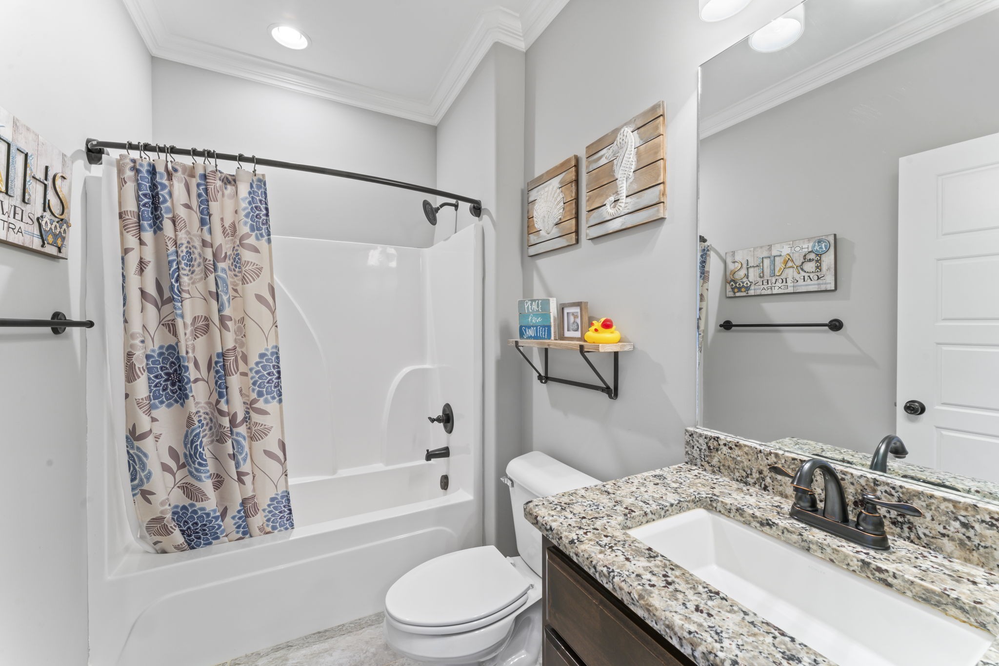 203 County Line Road Bell Buckle, TN 37020 - Photo 17 of 31 a bathroom with a granite countertop sink toilet and shower