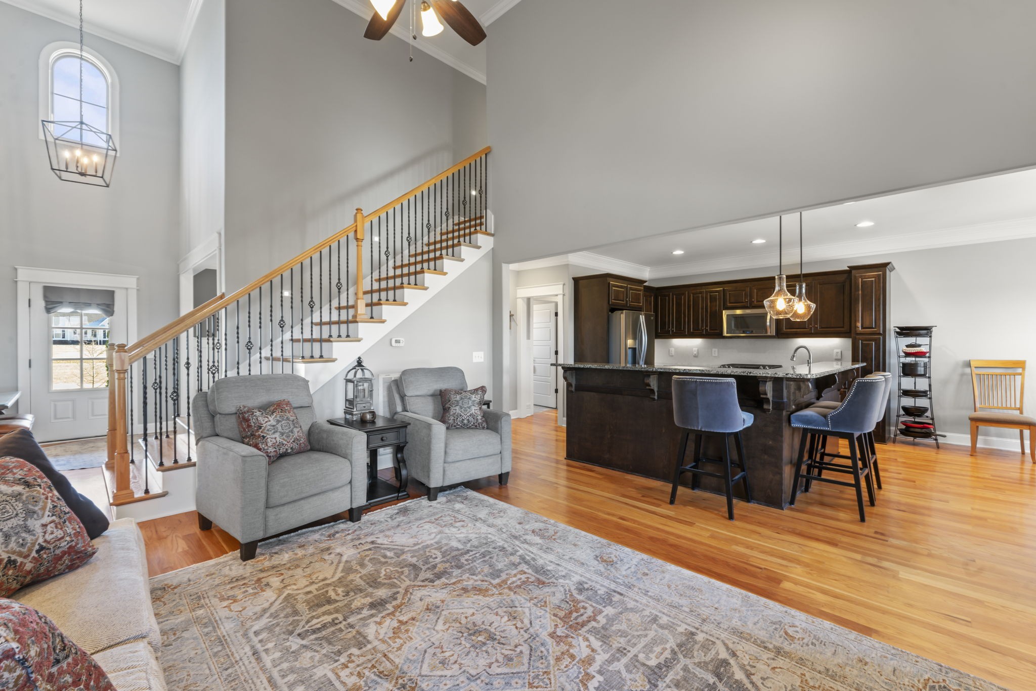 203 County Line Road Bell Buckle, TN 37020 - Photo 5 of 31 a living room with furniture kitchen view and a wooden floor