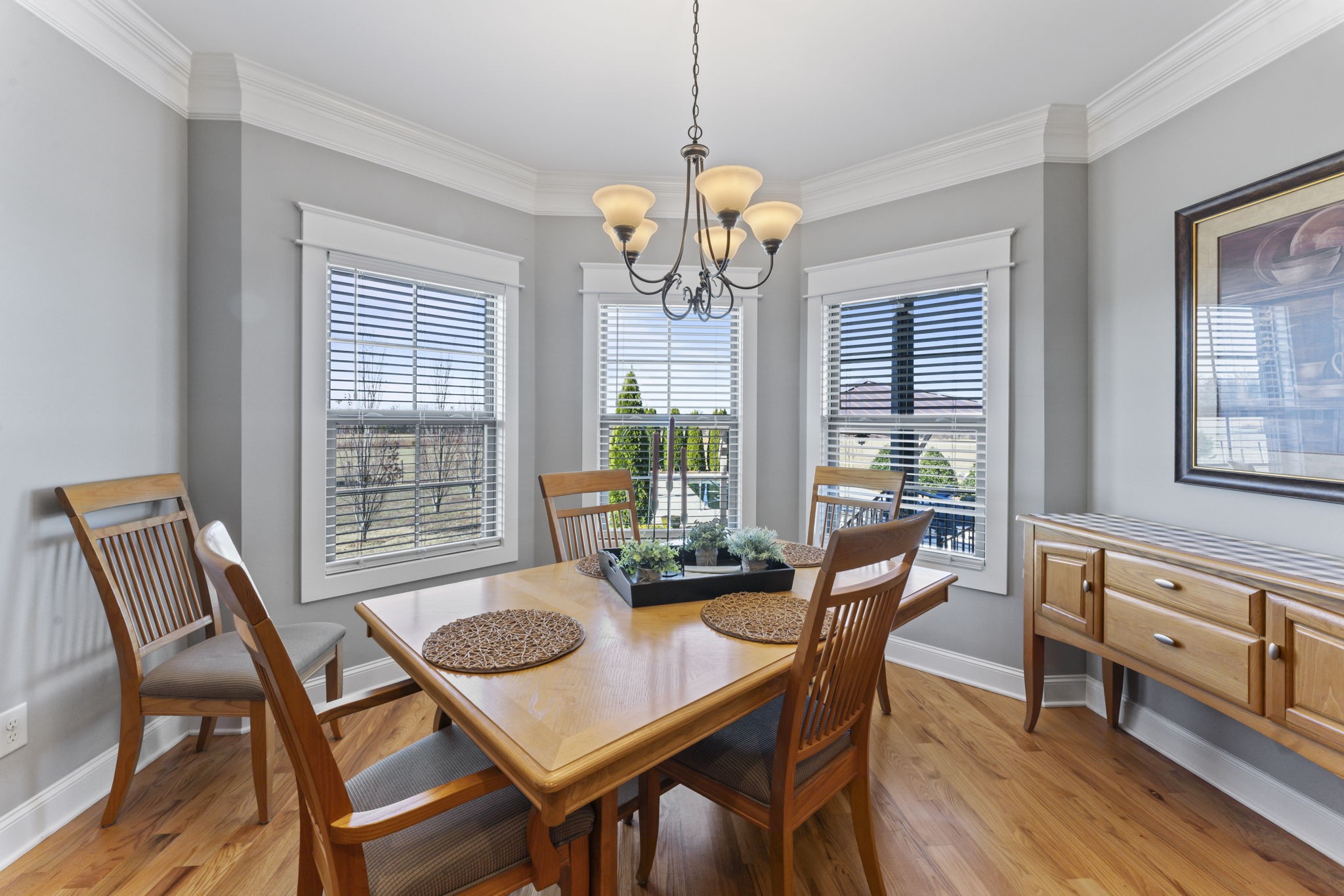203 County Line Road Bell Buckle, TN 37020 - Photo 9 of 31 a view of a dining room with furniture wooden floor and a chandelier