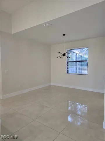 a view of a livingroom and a window