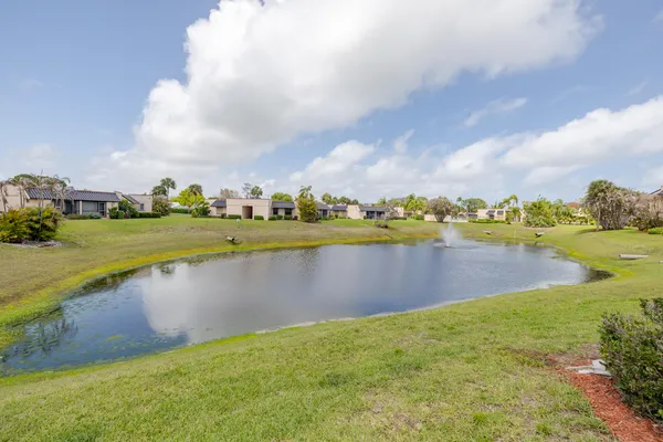 a view of a lake with a big yard