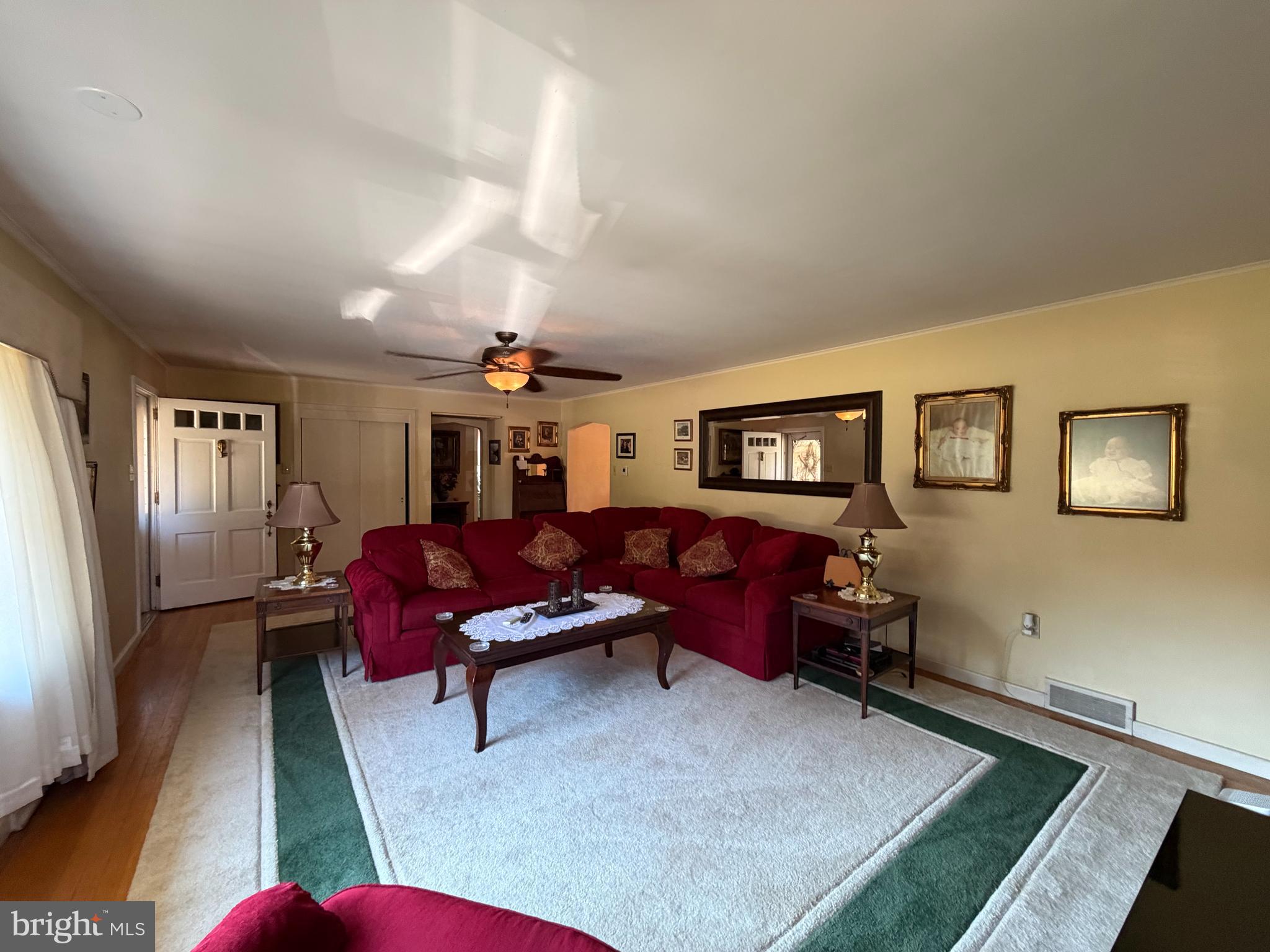 415 South Tulpehocken Road Reading, PA 19601 - Photo 16 of 50 a living room with furniture gym equipment and a rug