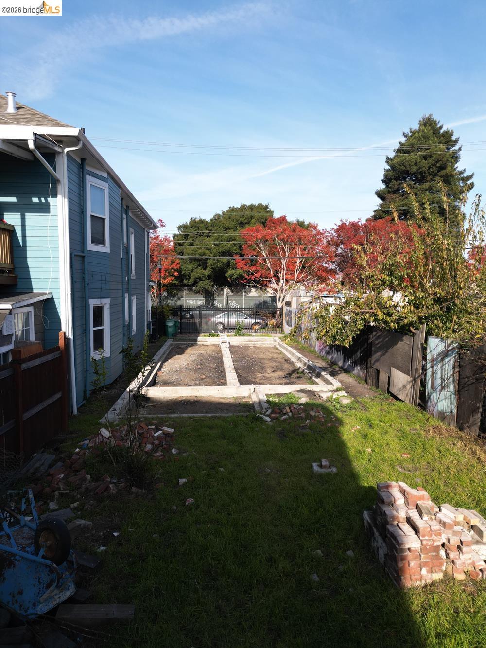 0 8th Street Oakland, CA 94607 - Photo 9 of 56 a view of a house with a swimming pool and a yard