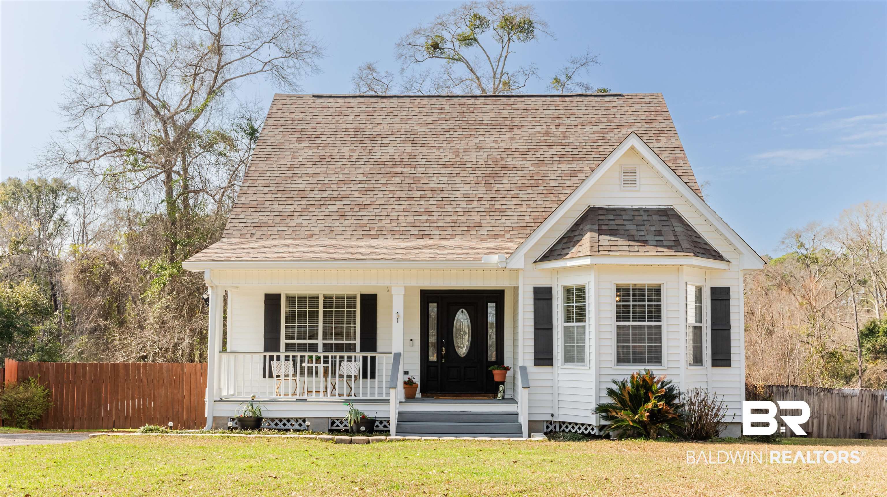 3844 Isabel Way South Mobile, AL 36693 - Photo 1 of 49 View of front of home with covered porch and a front lawn