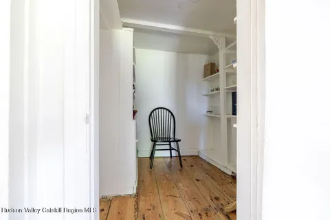 a view of a hardwood floor and in a bathroom