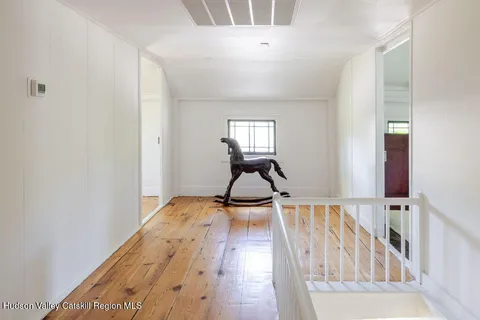 a front view of a house with wooden floor