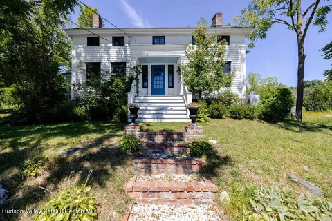 a house view with a garden space