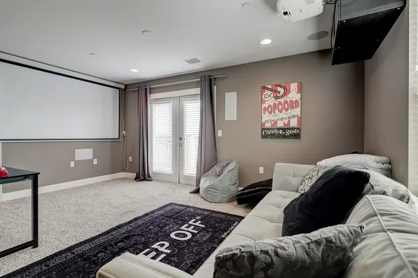 a bedroom with a bed and dresser