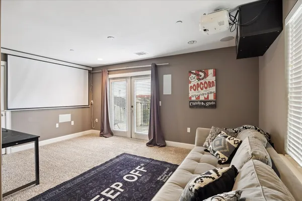 a bed room with a bed and a couch