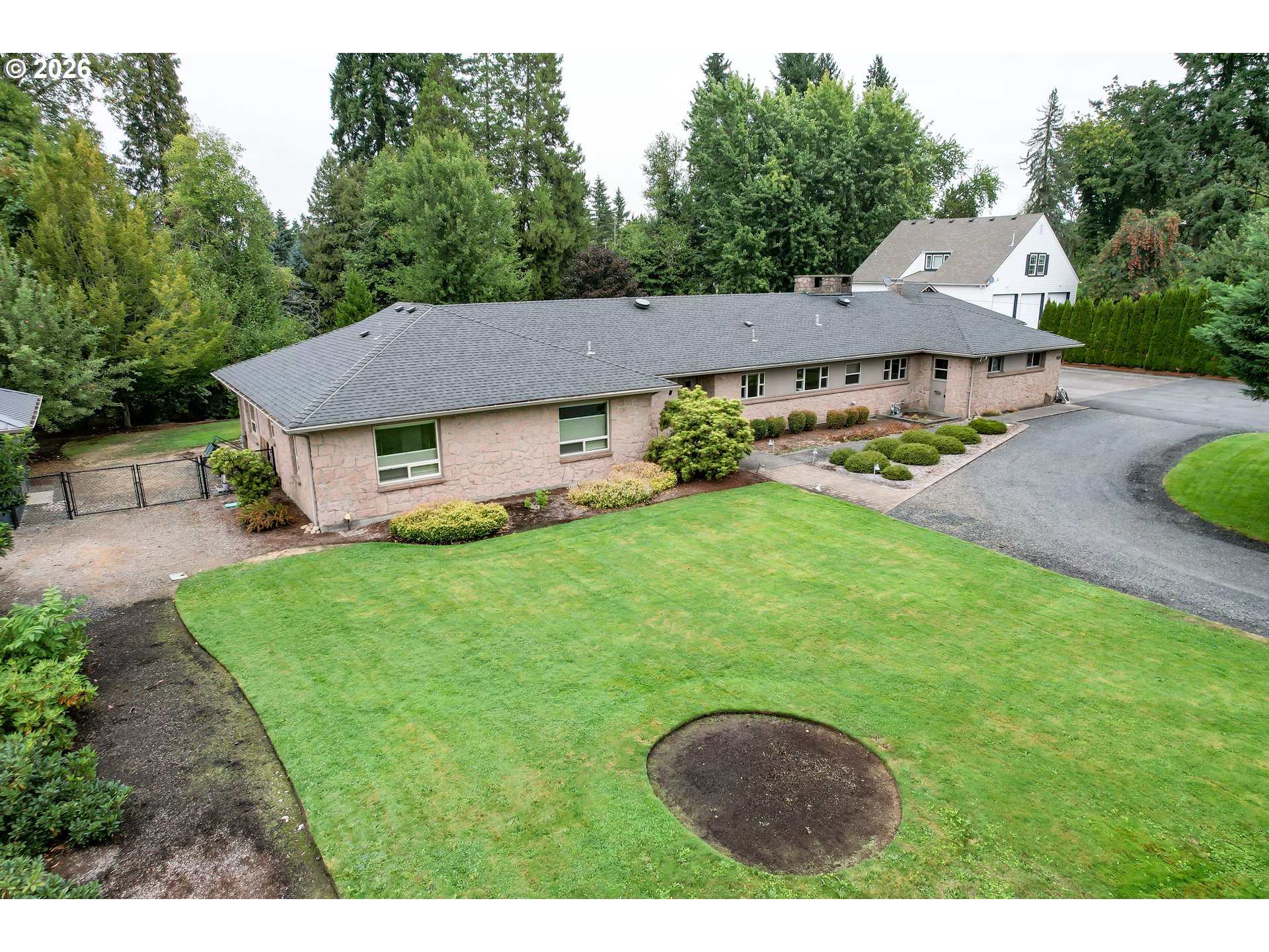 455 West High Street Stayton, OR 97383 - Photo 1 of 48 a aerial view of a house with garden