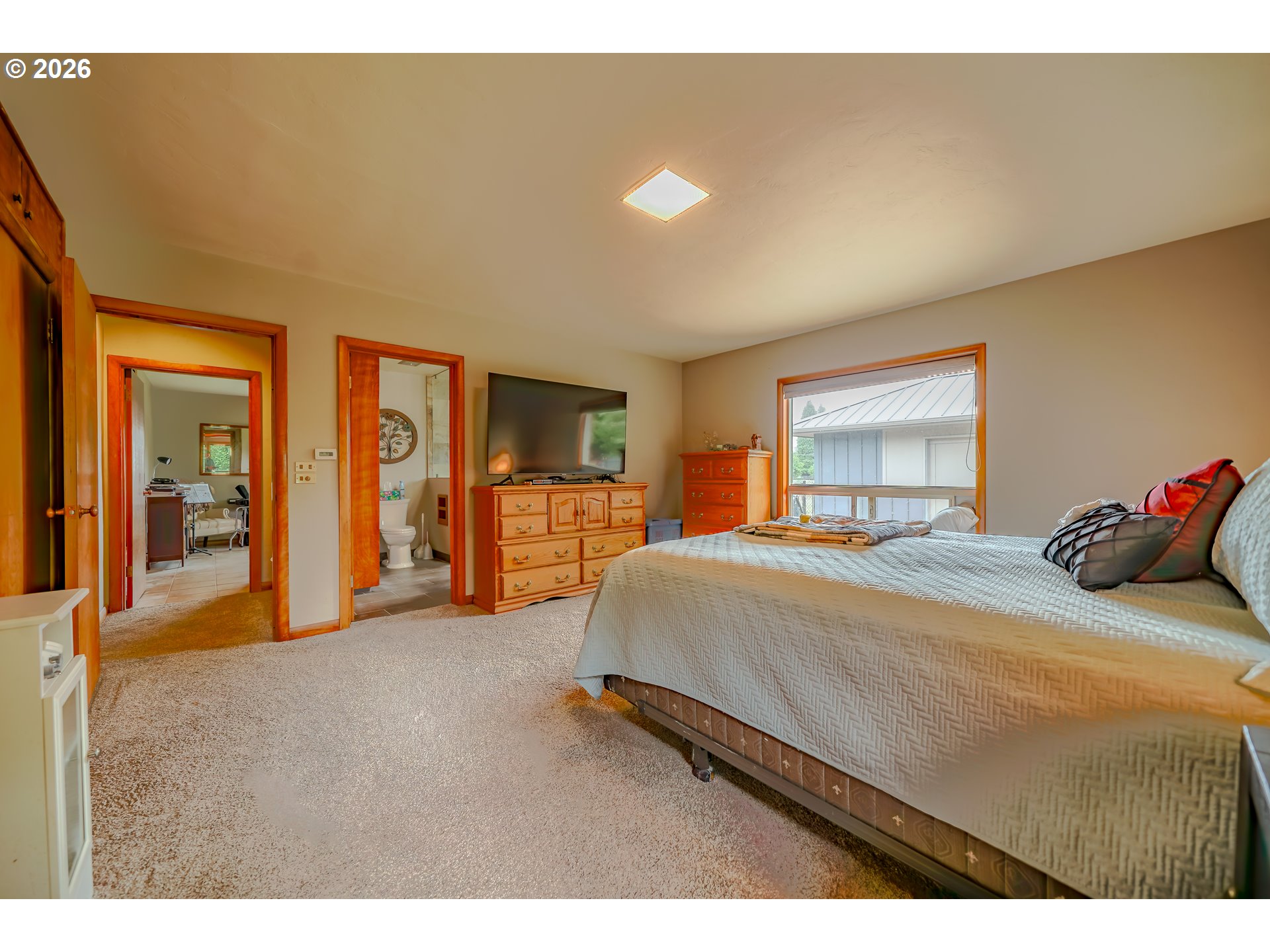 455 West High Street Stayton, OR 97383 - Photo 19 of 48 a bedroom with a large bed and two dresser