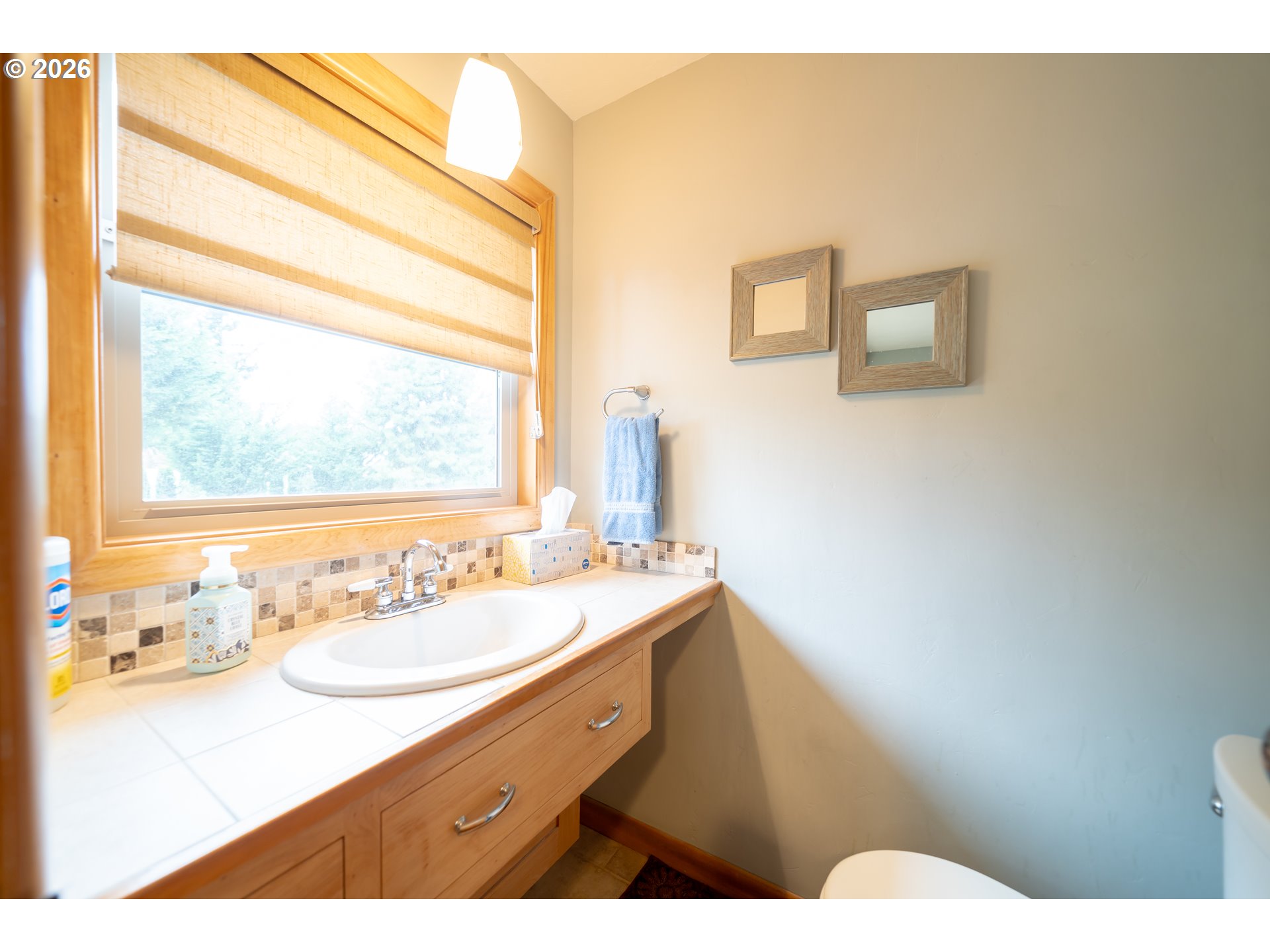 455 West High Street Stayton, OR 97383 - Photo 25 of 48 a bathroom with a sink vanity mirror and toilet