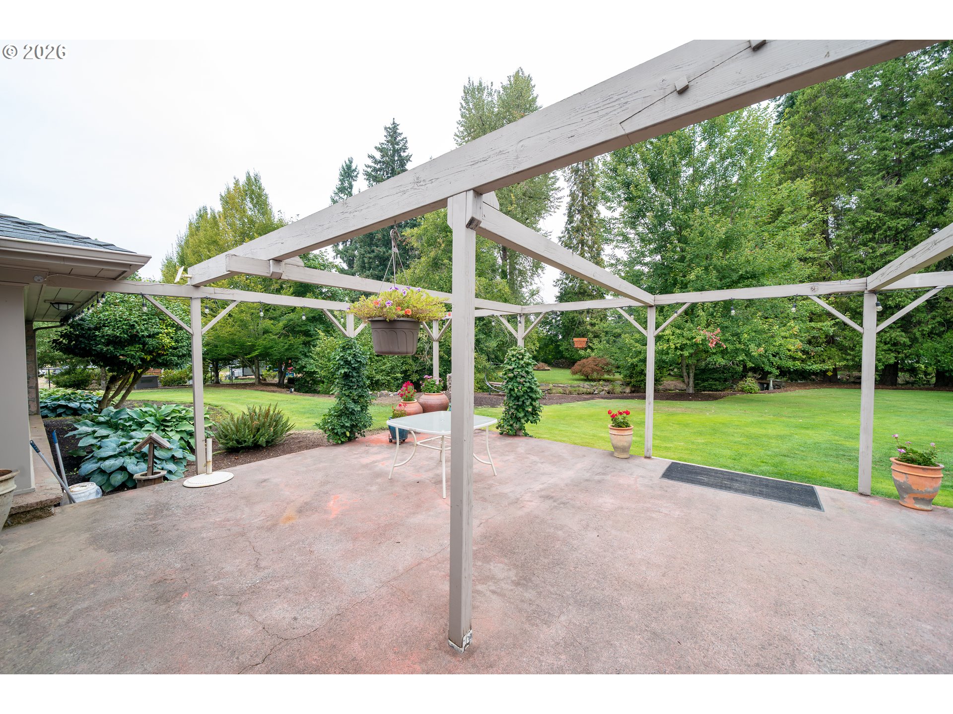 455 West High Street Stayton, OR 97383 - Photo 29 of 48 a view of a house with backyard and porch