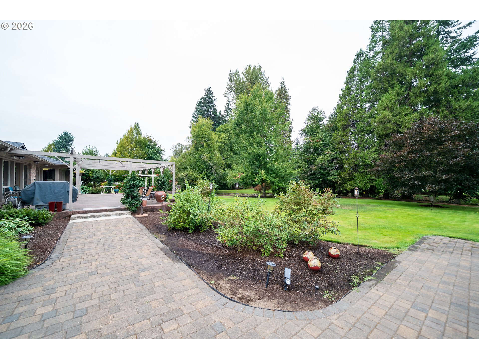 455 West High Street Stayton, OR 97383 - Photo 30 of 48 a view of a park with large trees