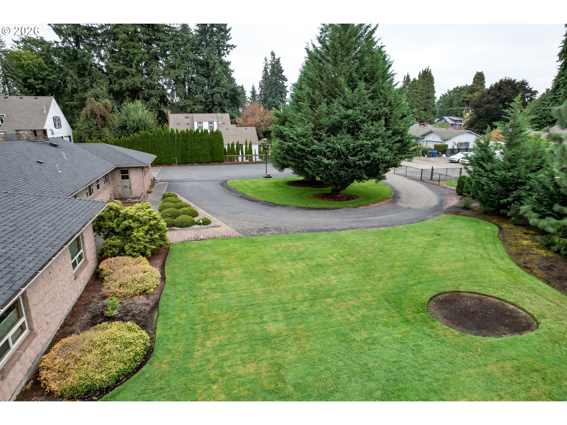 455 West High Street Stayton, OR 97383 - Photo 3 of 48 a view of a garden with a yard