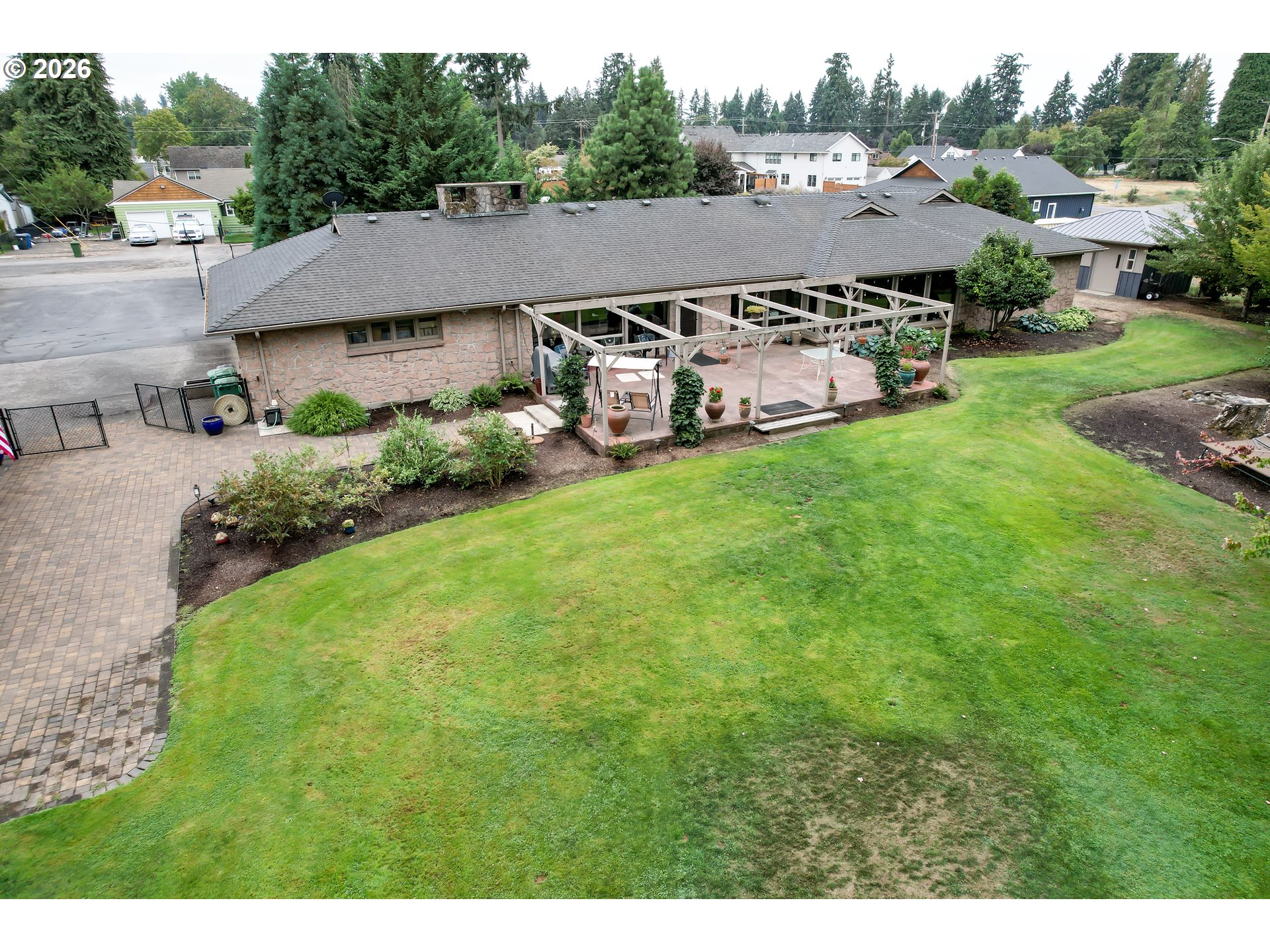 455 West High Street Stayton, OR 97383 - Photo 32 of 48 a aerial view of a house with garden
