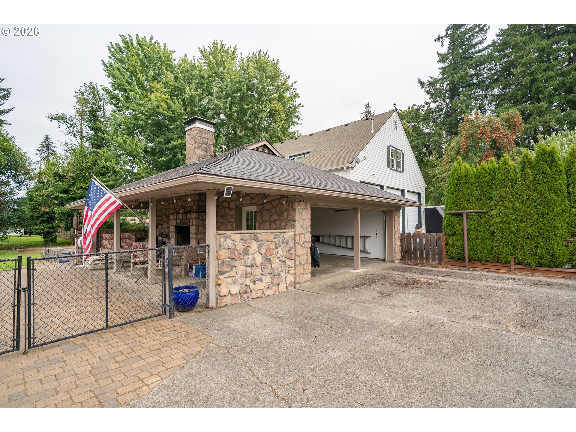 455 West High Street Stayton, OR 97383 - Photo 34 of 48 a view of a house with a yard
